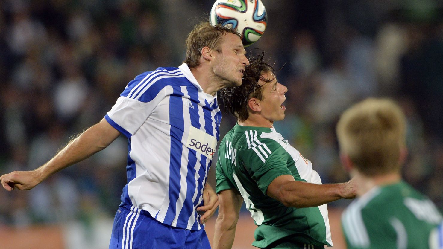 HJK became the first Finnish club to play in the Europa League group stages. HJK's Markus Heikkinen (left) is pictured.