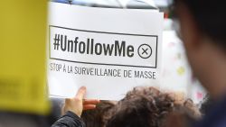 Protesters holding placards reading "Stop to mass surveillance" take part on May 4, 2015 in Paris in a demonstration against the government's controversial bill giving spies sweeping new surveillance powers, deemed "heavily intrusive" by critics. AFP PHOTO / ALAIN JOCARDALAIN JOCARD/AFP/Getty Images