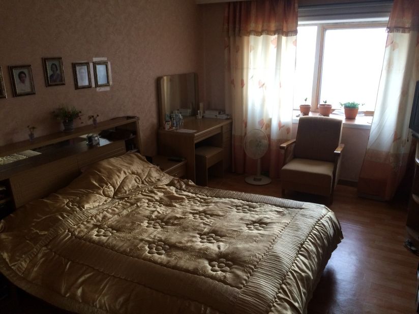 This is the master bedroom of the three-bedroom apartment. A university professor lives in the home with his adult children. It's 200 square meters (about 2,150 square feet). That's large for an apartment in Pyongyang.