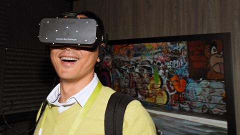 Bin Li tries out Oculus's Crescent Bay prototype at the 2015 International CES in Las Vegas, Nevada. 