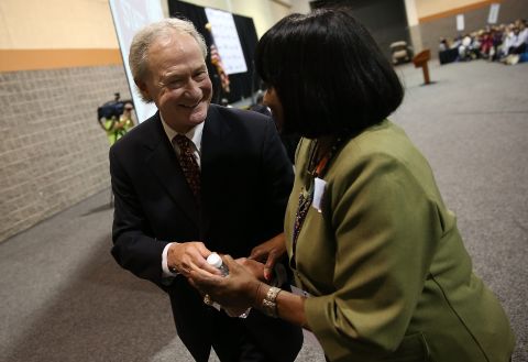Chafee greets a member of the audience after speaking at the South Carolina Democratic Party state convention on April 25.