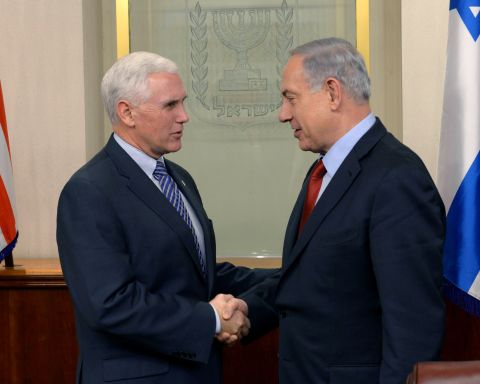 Pence, left, shakes hands with Israeli Prime Minister Benjamin Netanyahu on December 29, 2014, in Jerusalem. 
