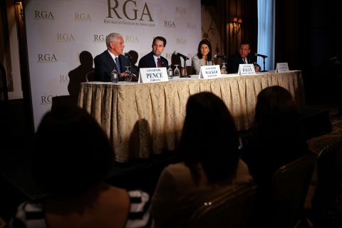 Pence, from left, Wisconsin Gov. Scott Walker, South Carolina Gov. Nikki Haley and New Jersey Gov. Chris Christie attend a news briefing during the Republican Governors Association's quarterly meeting on May 21, 2014, in New York.