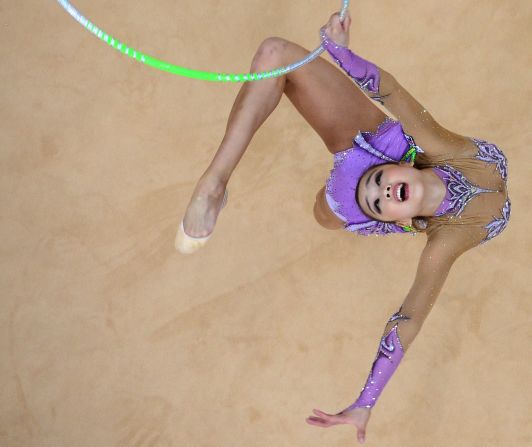She's the reluctant "fairy" who has charmed a nation with her joyous rhythmic gymnastics routines. <a href="index.php?page=&url=https%3A%2F%2Fwww.cnn.com%2F2015%2F05%2F06%2Fsport%2Fson-yeon-jae-rhythmic-gymnastics-korea-feat%2Findex.html" target="_blank">Read more</a>