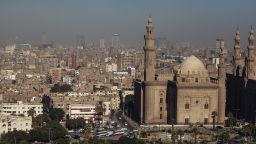 The Sultan Hassan Mosque and city skyline of Cairo are seen from the Muhammad Ali Mosque in Cairo's Citadel on October 21, 2013 in Cairo, Egypt. 