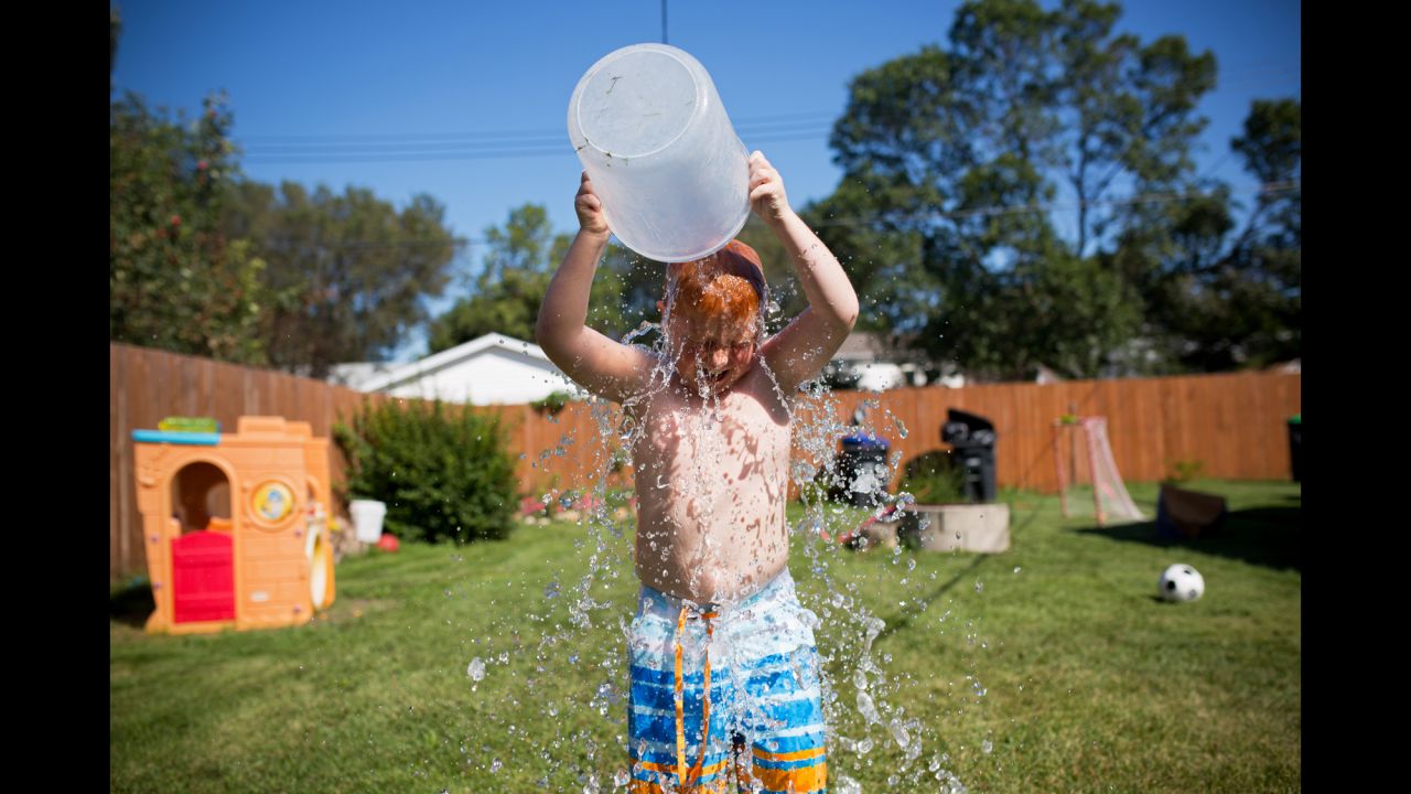 Colin takes the Ice Bucket Challenge on a hot August day to raise awareness of ALS. Moments later, Emily also completed the challenge, and both of the children doused their grandma while their mom recorded video. Cheryl's father, Doug Mauthe, died from complications of ALS in December 2012.
