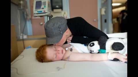 Colin gets a kiss on the cheek as he wakes up from a medical procedure in October. He goes to Winnipeg once a month for chemotherapy treatment, and he must undergo a lumbar puncture every three months to confirm the cancer hasn't spread to his spinal fluid or brain.