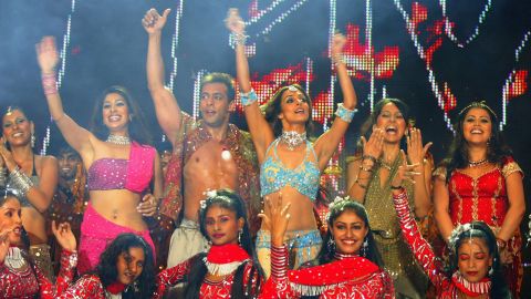 In 2003, Khan performs with MTV VJs Ramona, Sophia, Malaika, Anusha and Shenaz during the Inaugural MTV IMMIES in Mumbai, India. 