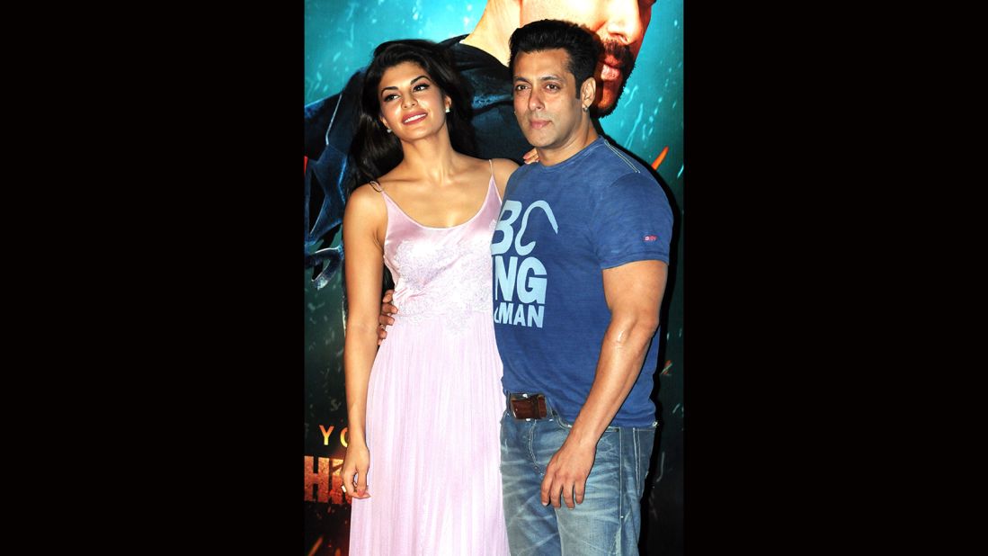 Indian Bollywood actors Jacqueline Fernandez, left, and Salman Khan pose for a photograph during a promotional event for the Hindi film "Kick" in Mumbai, India. 