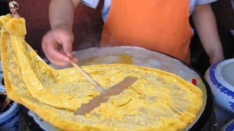 Chinese Internet users Photoshopped Rihanna's cape onto photos of jianbing, a fried pancake.