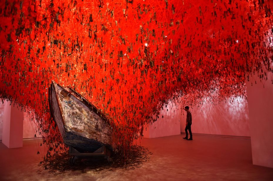 MAY 5 -- VENICE, ITALY: A visitor looks at 'The Key in the Hand' by Japanese artist Chiharu Shiota presented at Japan's pavilion at the 56th International Art Exhibition Biennale d'Arte, titled 'All the Worlds Futures'. The exhibition opens to the public on May 9 in various locations across the city.