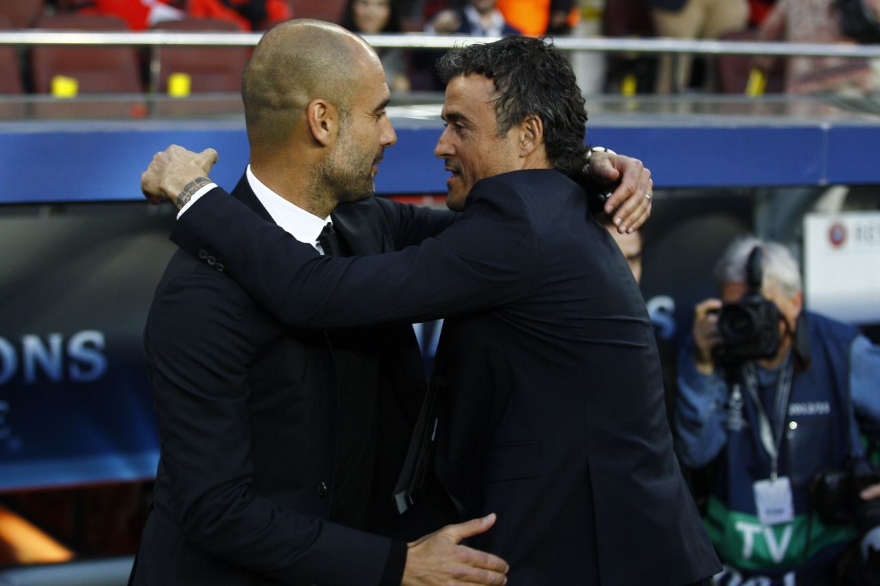 Bayern Munich's Spanish head coach Pep Guardiola (L) and Barcelona's coach Luis Enrique greet each other before the UEFA Champions League football match FC Barcelona vs FC Bayern Muenchen at the Camp Nou stadium in Barcelona on May 6, 2015.