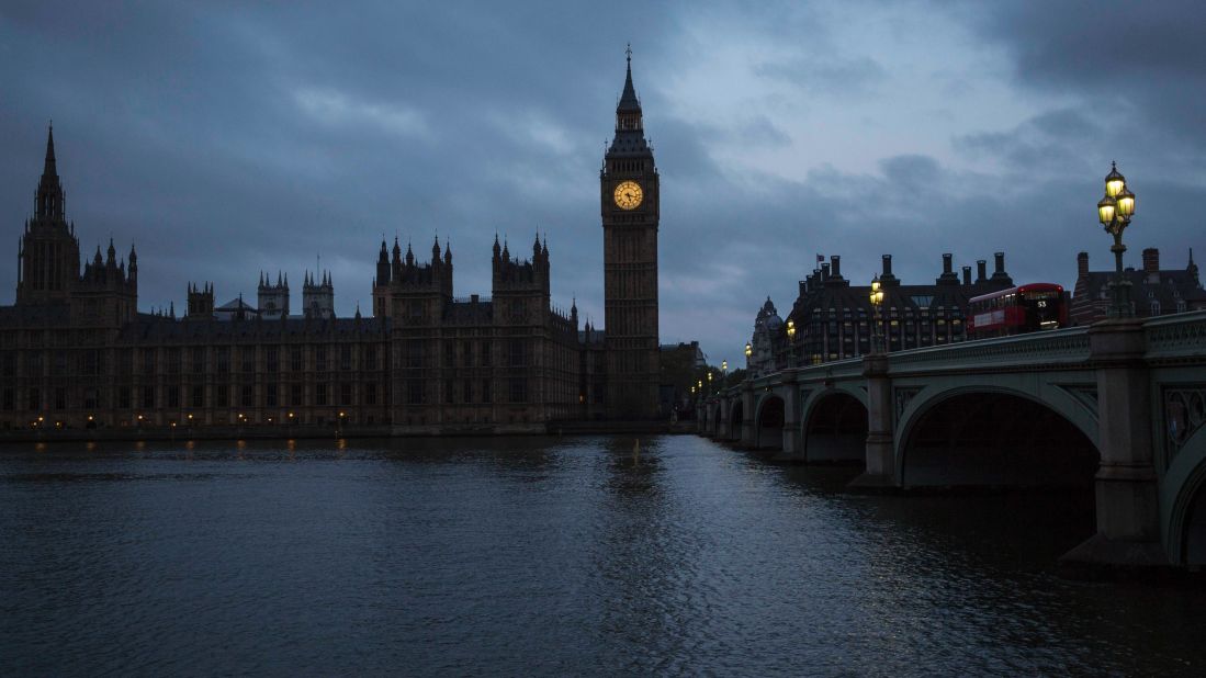 Clouds roll over Big Ben and the Houses of Parliament in London early Thursday, May 7.
