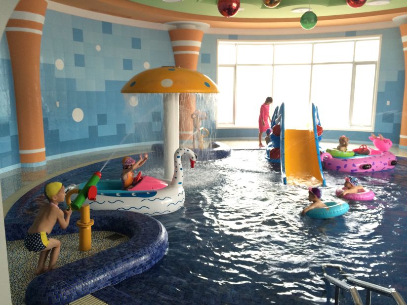 The orphanage features a pool area for the children, who live and study in the complex.