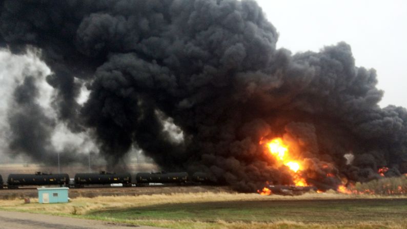 Fire and smoke spew from an oil train that derailed in Heimdal, North Dakota, on Wednesday, May 6. 