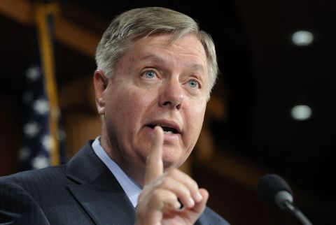 Graham speaks to reporters after a news conference about his Social Security reform plan at the U.S. Capitol on April 13, 2011.