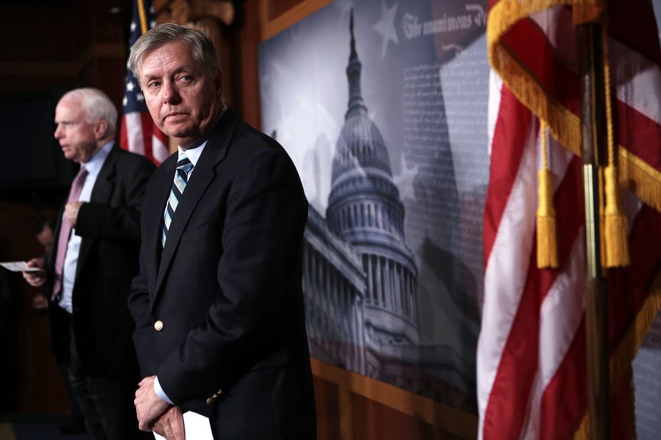 McCain, left, and Graham speak during a news conference about Benghazi on February 14, 2013, on Capitol Hill.