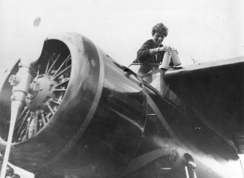 Earhart is seen in the cockpit of her single-engine Lockheed Vega 5B. Earhart was born in 1897 in Atchison, Kansas. She learned to fly after she was inspired by an airplane ride at an air show in 1920. She was the 16th woman to receive a pilot's license from the Federation Aeronautique Internationale.