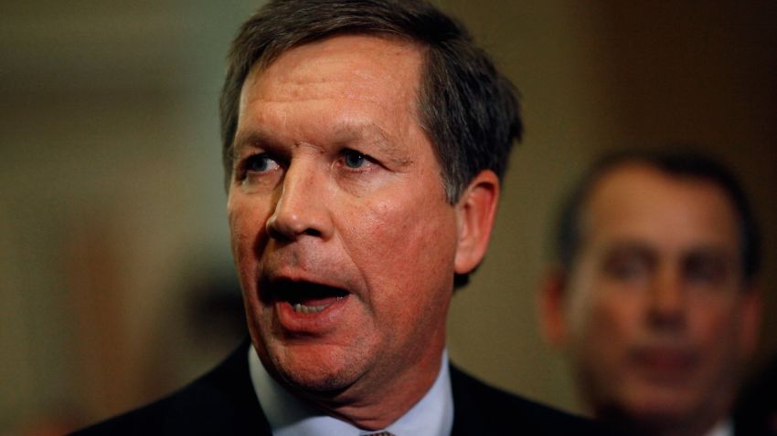 Before taking office, Governor-elect Kasich talks with reporters after meeting with House and Senate Republican leaders at the U.S. Capitol on December 1, 2010. The GOP leaders talked about ways to create jobs, cut spending and ways to repeal the health care law.