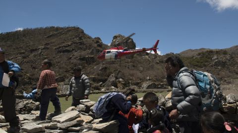 Helicopters usually ferry climbers to Everest Base Camp. This year, they have been carrying those who died or were injured in the quake back to lower ground.
