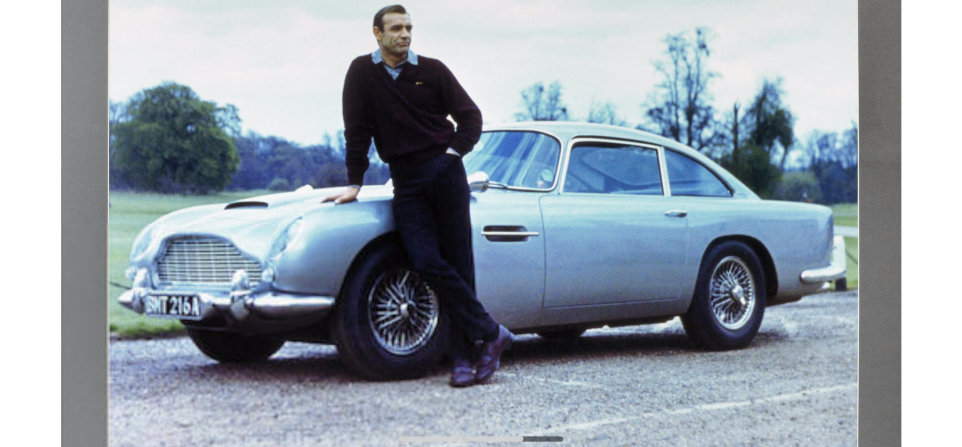 Prepare to pay between $3,800 and $4,600 for this fine photograph of James Bond with the DB5 at the Stoke Poges Golf Club, with autographs of Ian Fleming, David Brown and Sean Connery, measuring 83 x 111 cm overall. 