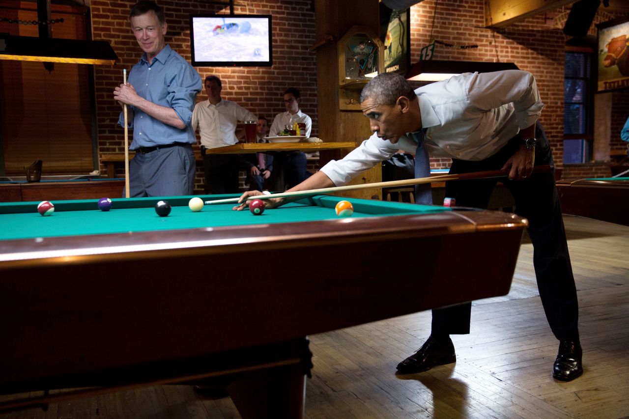 Playing pool with Gov. John Hickenlooper in Denver, Colorado, on July 8, 2014. 