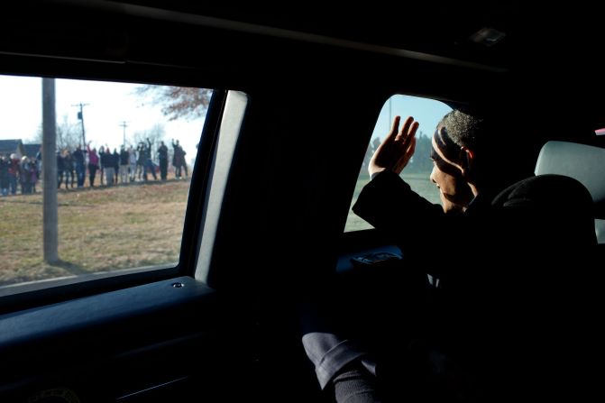 Waving to people after his economic speech in Osawatomie, Kansas, on December 6, 2011.