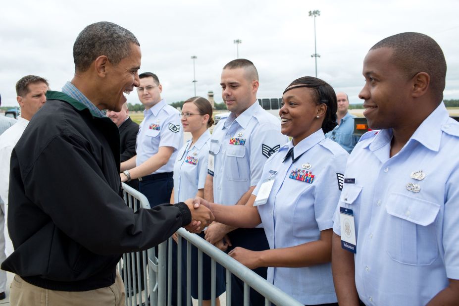 Greeting military personnel at Offutt Air Force Base near Omaha, Nebraska, on August 13, 2012. 