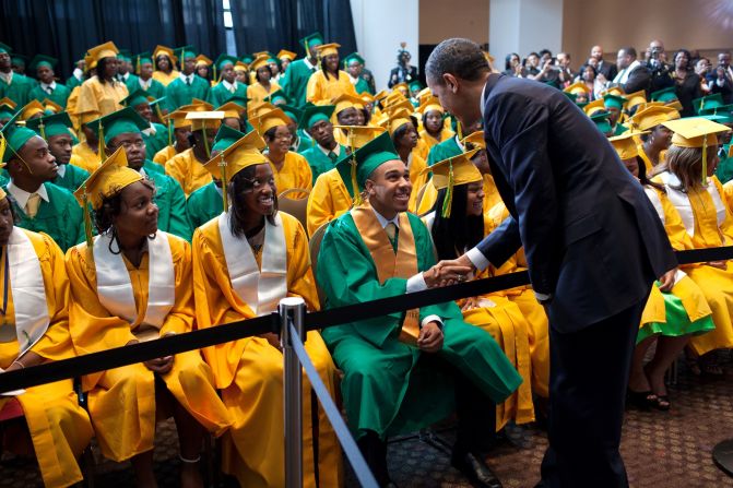 Shaking hands with Booker T. Washington students before their commencement ceremony in Memphis, Tennessee, on May 16, 2011.