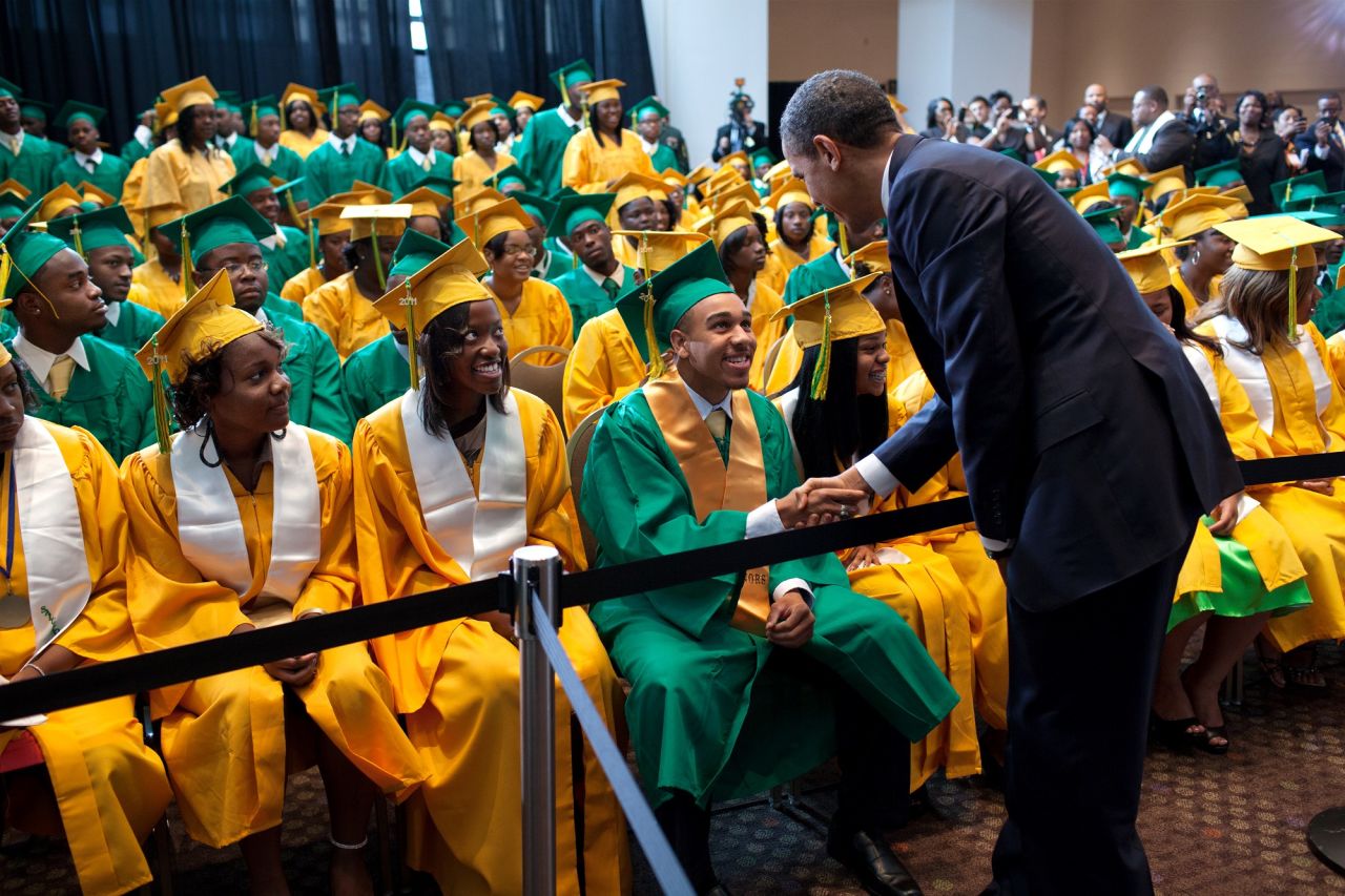 Shaking hands with Booker T. Washington students before their commencement ceremony in Memphis, Tennessee, on May 16, 2011. 