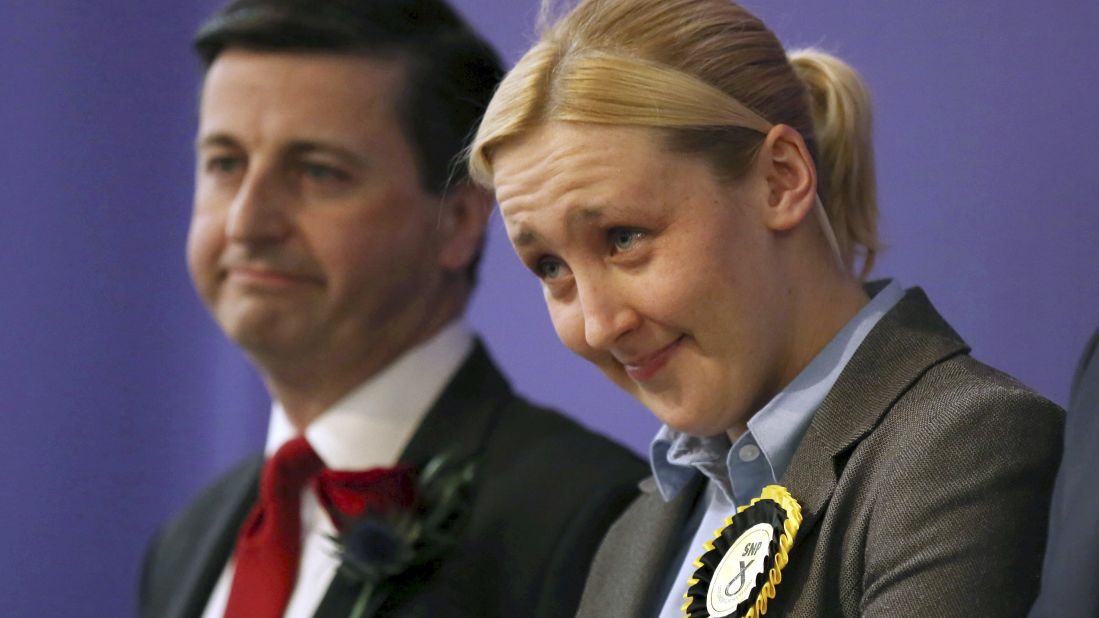 Paisley and Renfrewshire South constituency winner Mhairi Black of the Scottish National Party and the Labour Party's Douglas Alexander stand together in Paisley, Scotland, on May 8. Black, 20, became the youngest British MP since 1667 after unseating Alexander.