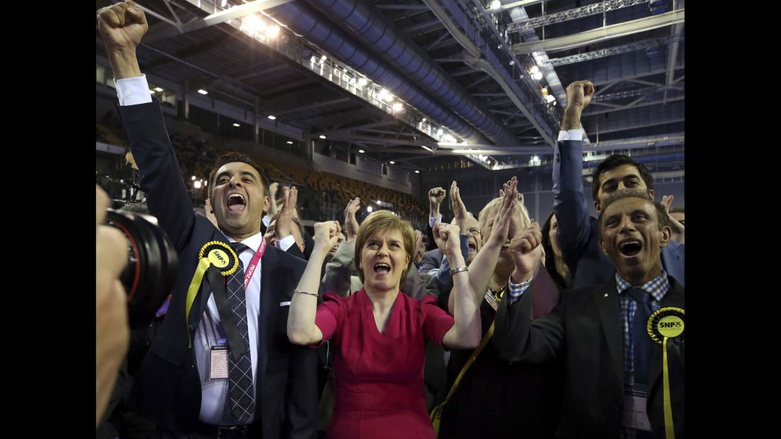 First Minister of Scotland and Scottish National Party leader Nicola Sturgeon, center, celebrates the results for her party in Glasgow, Scotland, May 8.