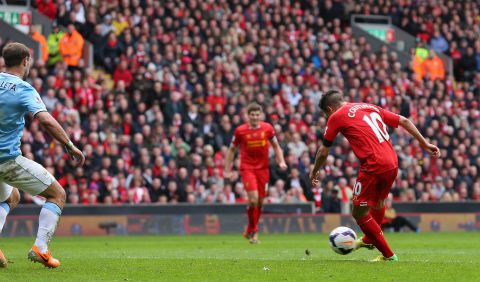 Coutinho swivels and scores what Luis Suarez thought was the goal of the 2013-2014 Premier League season against Manchester City.