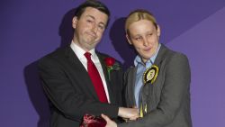 Newly elected Scottish National Party (SNP) member of parliament, Mhairi Black (R), Britain's youngest member of parliament since 1667, greets Labour candidate Douglas Alexander (L) during the declaration of the general election results for the constituency of Paisley and Renfrewshire South at the Lagoon Leisure Centre, in Paisley, west of Glasgow, Scotland on May 8, 2015.