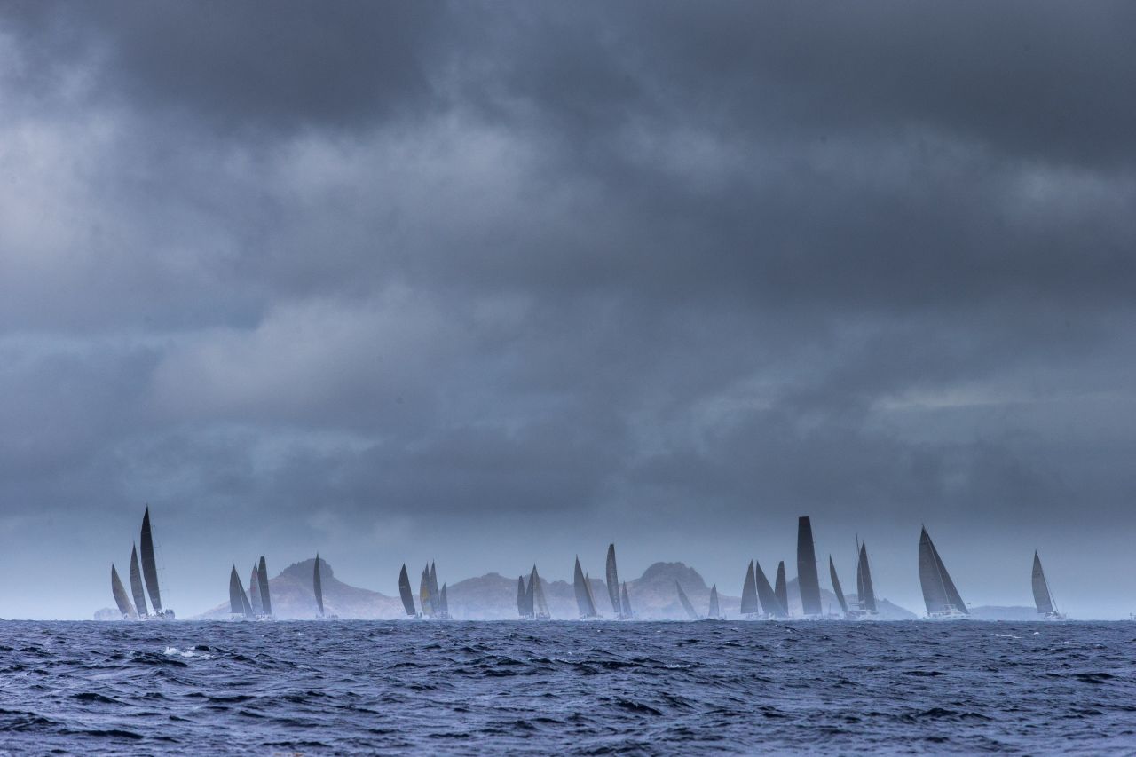 Yachts -- and clouds -- gather as racing draws to a close.