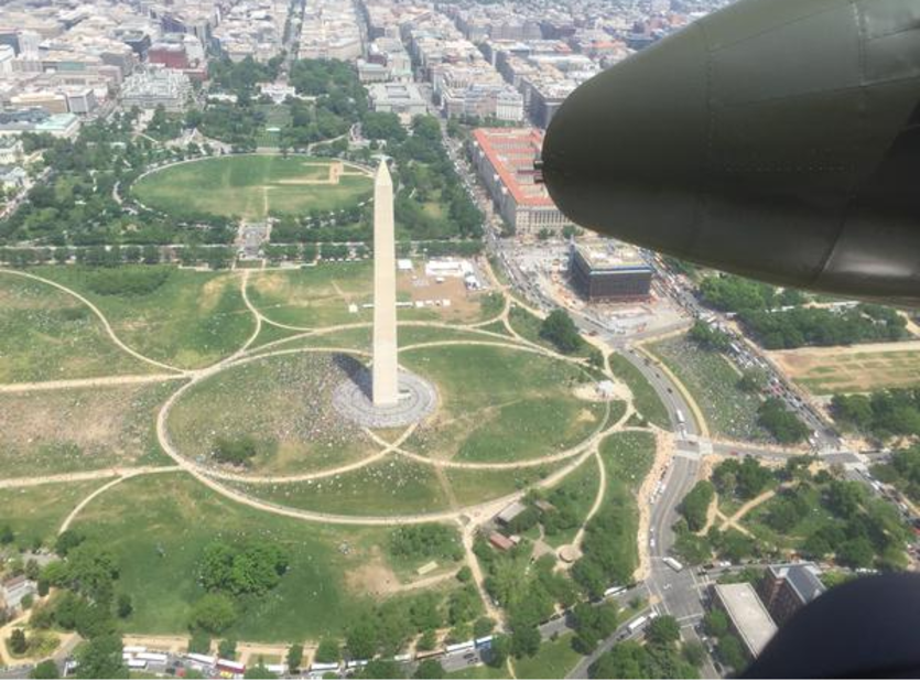 The Washington Monument and White House whoosh past below the B-25.
