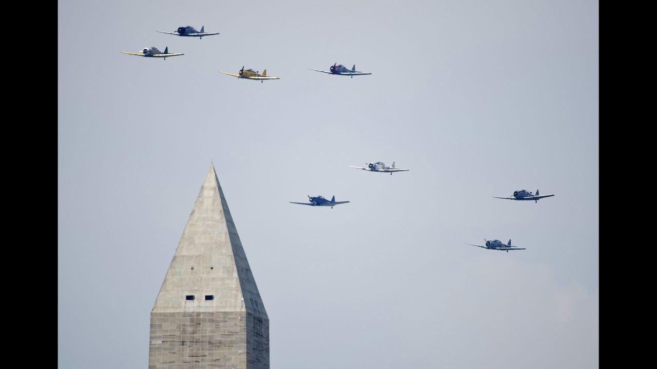World War II-era planes fly over the Washington Monument on Friday, May 8, during a celebration of the 70th anniversary of V-E (Victory in Europe) Day -- the day Germany surrendered to the Allies, ending the European phase of the war.