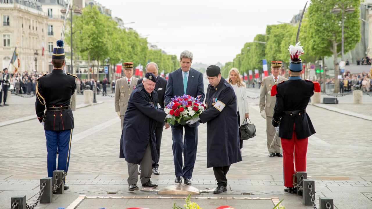 U.S. Secretary of State John Kerry lays a wreath at the Tomb of the Unknown Soldier in Paris.