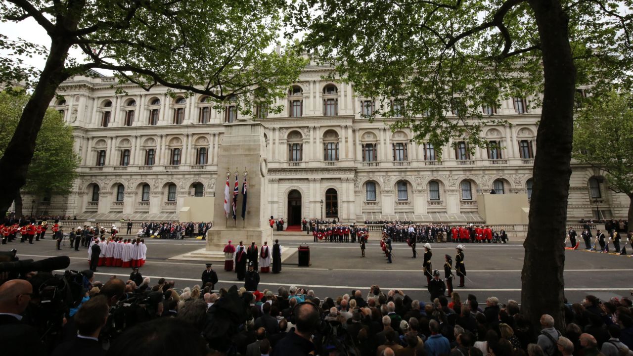 UK representatives gather for the tribute at the Cenotaph.