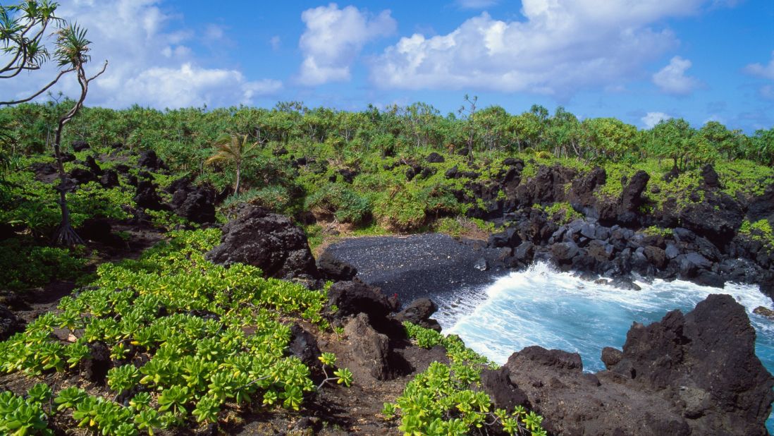 <strong>Wai'anapanapa State Park, Hawaii.</strong>  The stunning blue sea combined with black volcanic sand near the end of the renowned 52-mile Hana Highway on Maui make this 60-campsite spot an incredible way to explore Hawaii.  