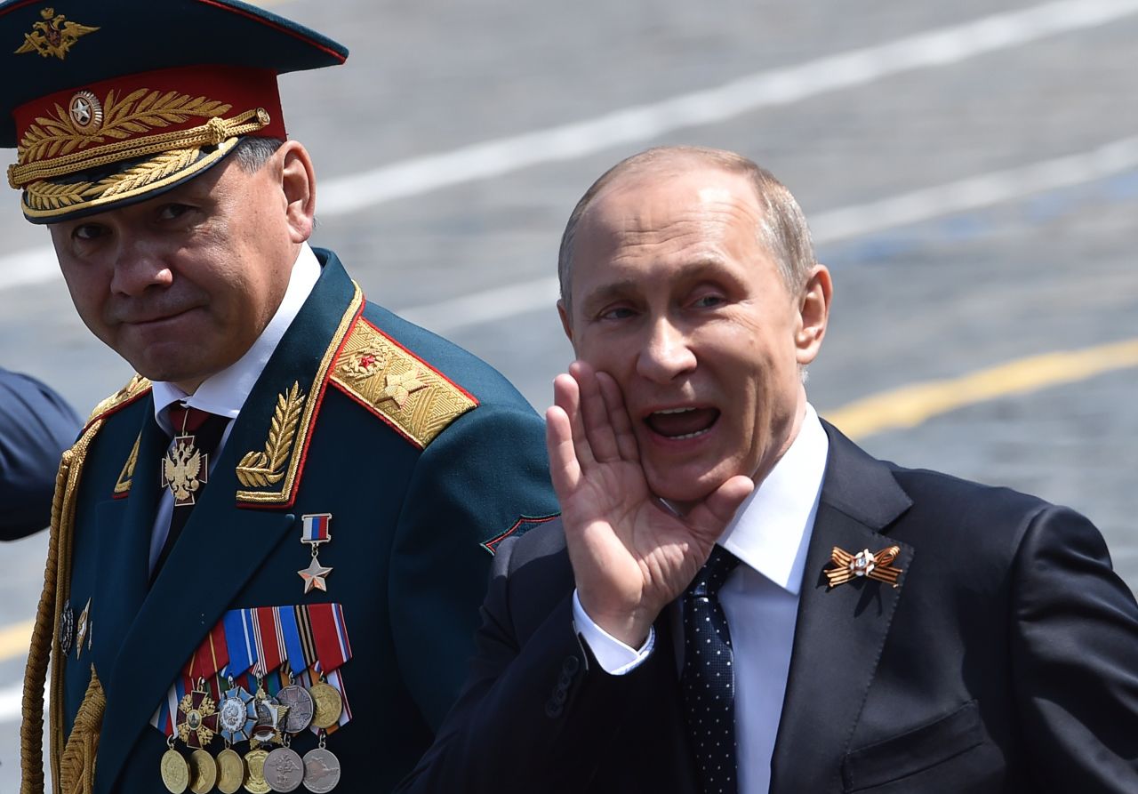 Russian President Vladimir Putin and Defence Minister Sergei Shoigu leave Red Square after the Victory Day parade.