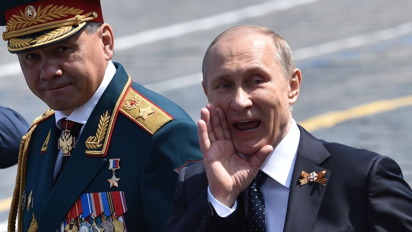 Russian President Vladimir Putin and Defence Minister Sergei Shoigu leave Red Square after the Victory Day parade.