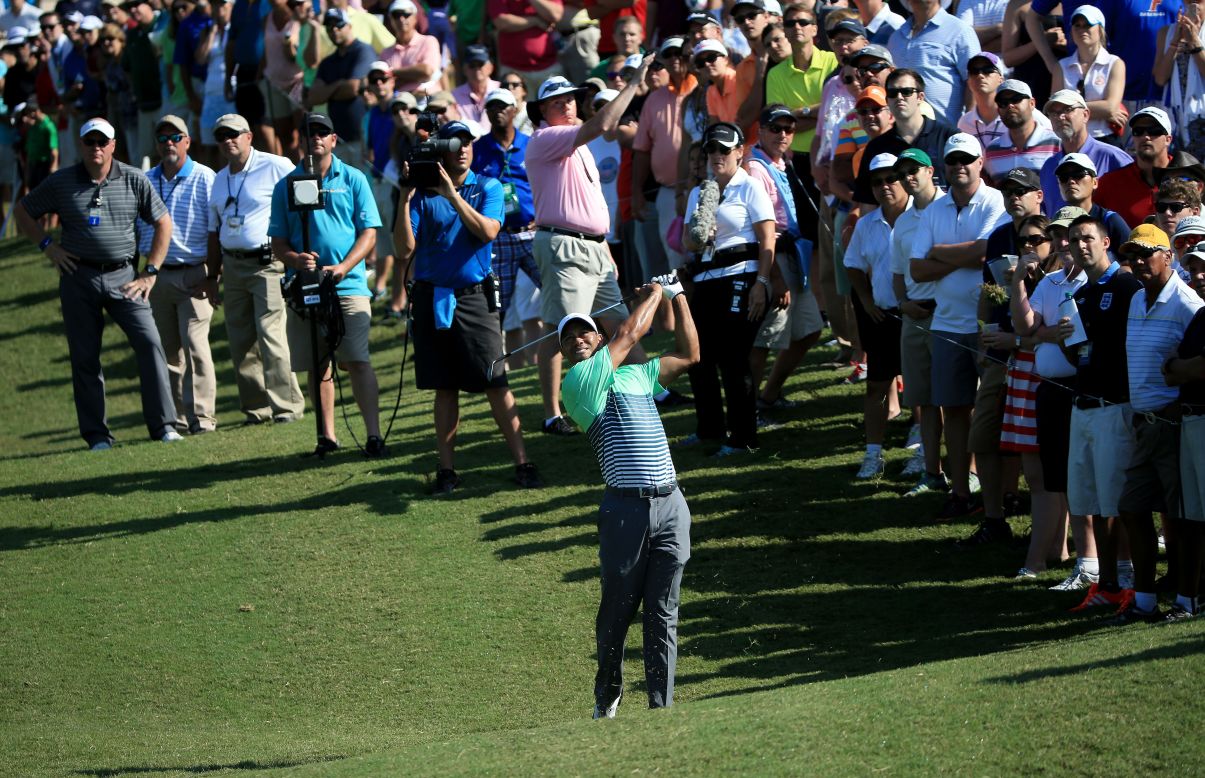 Crowds gather to watch Woods in action at the Players Championship.