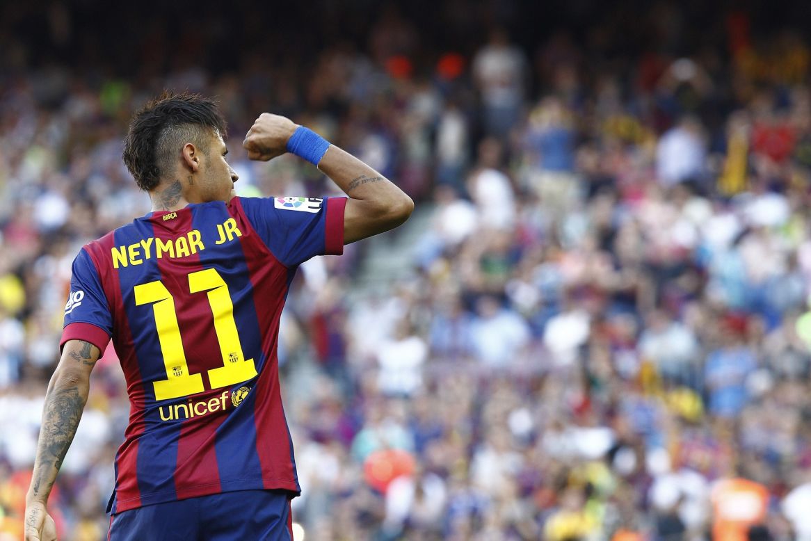 Barcelona ended the day four points clear at the top, having beaten Real Sociedad 2-0 before Real's slip-up. Neymar celebrates his 50th goal for the Catalan club. 