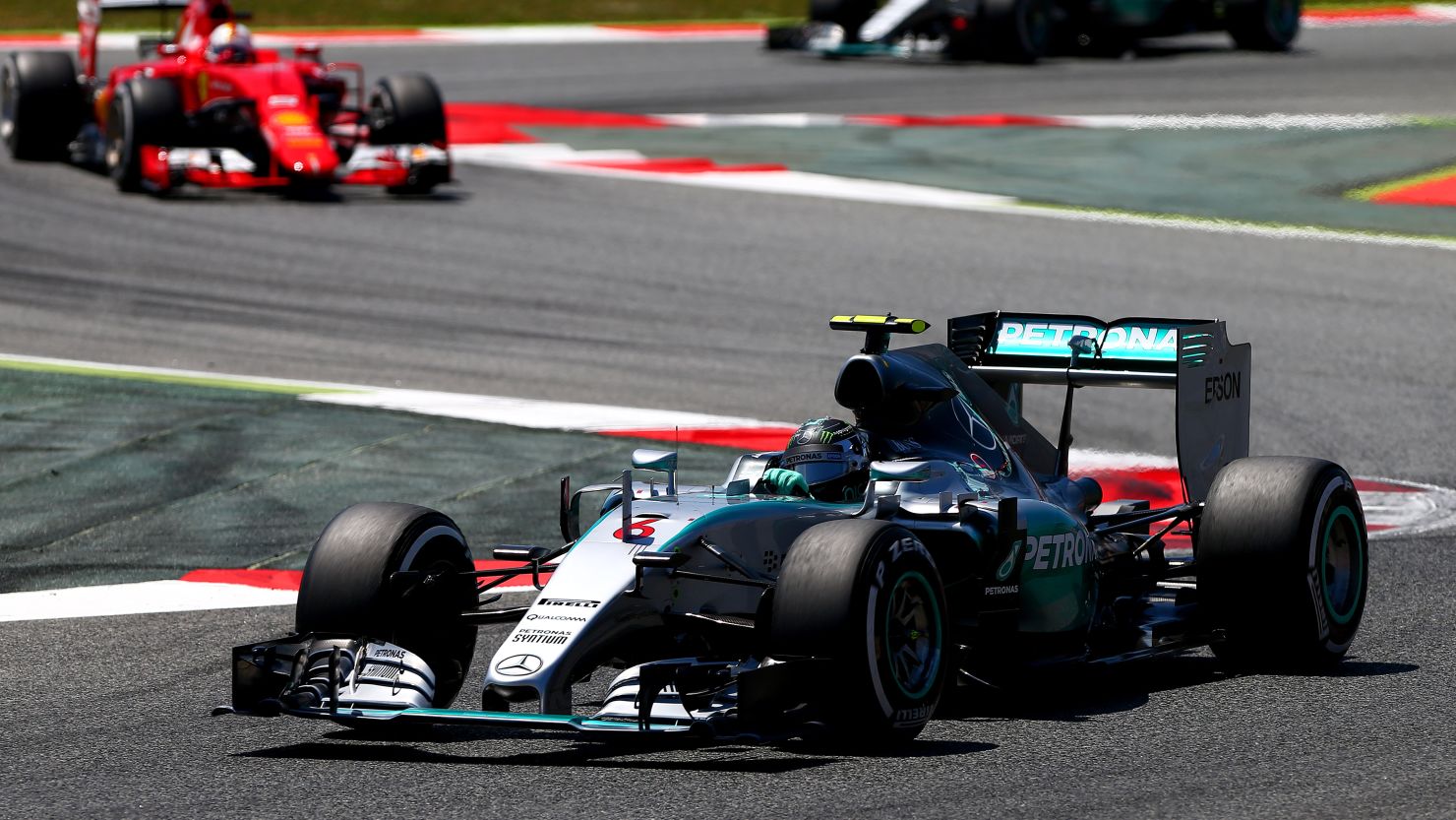 Nico Rosberg pulls clear of Ferrari's Sebastian Vettel and Mercedes teammate Lewis Hamilton in the opening laps.
