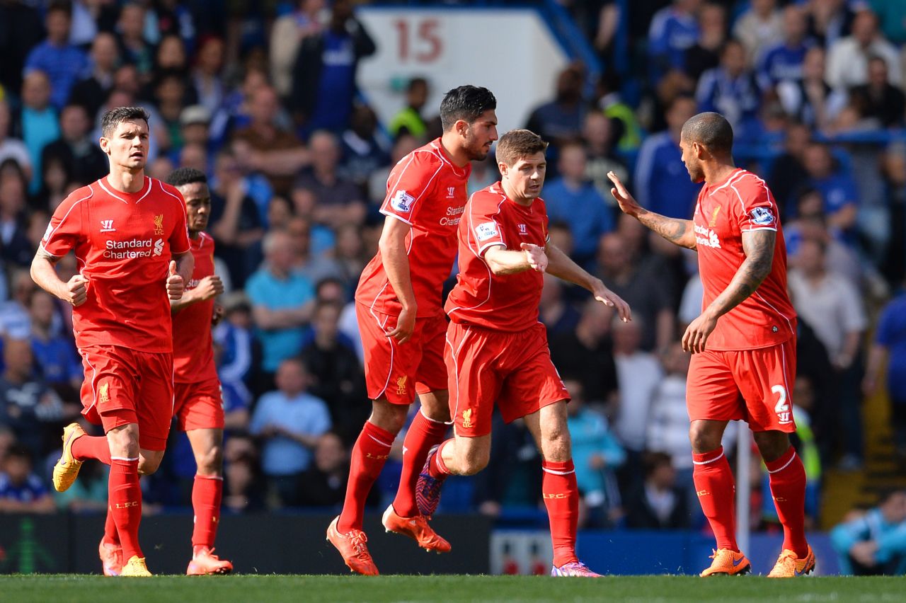 Steven Gerrard is congratulated by teammates after scoring Liverpool's equalizer at Stamford Bridge.