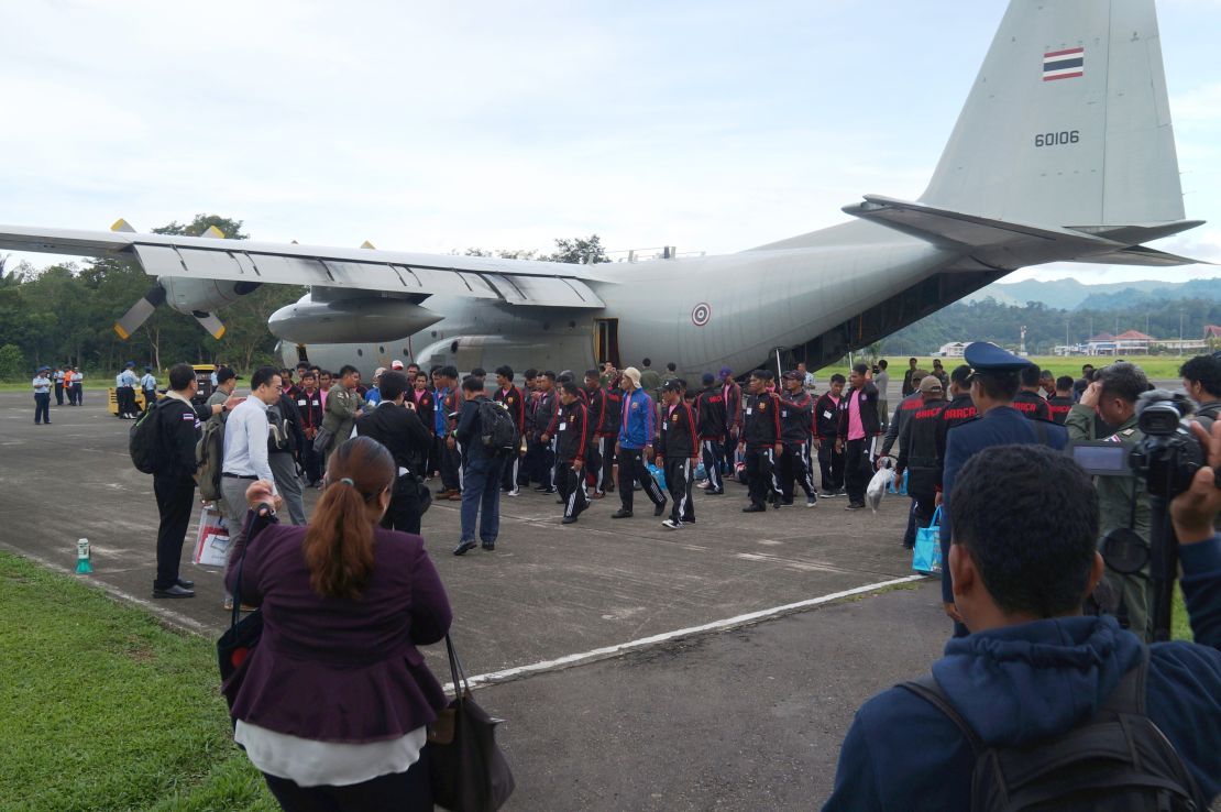 Fishermen board a Thai military plane in Ambon, Indonesia on April 9 during their repatriation.