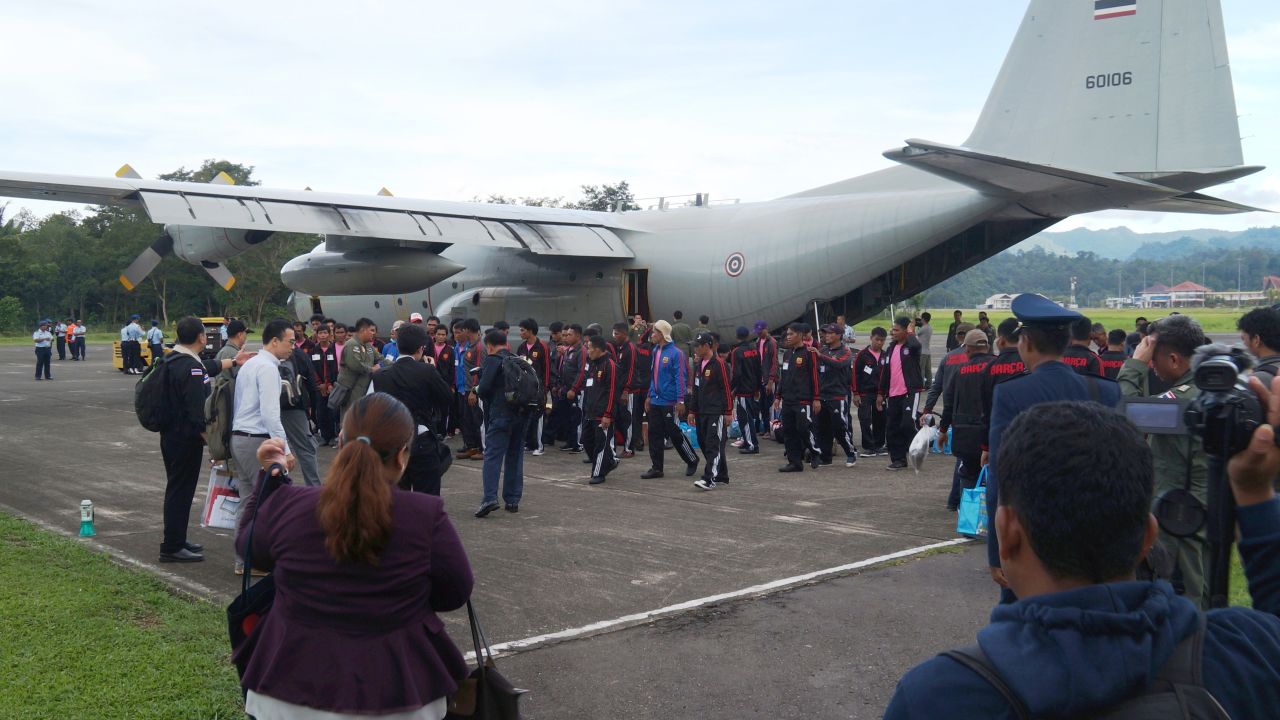 Fishermen board a Thai military plane in Ambon, Indonesia on April 9 during their repatriation.