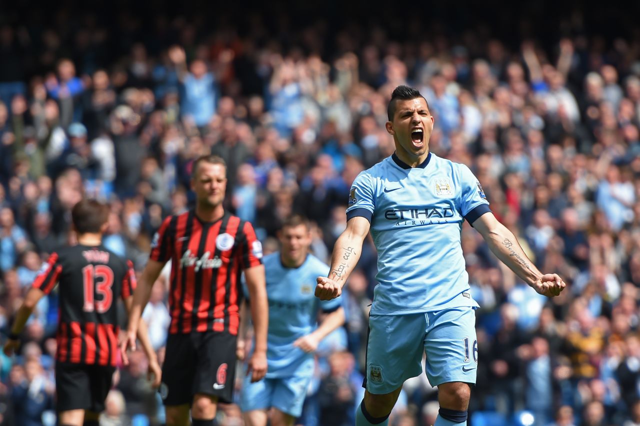 Sergio Aguero celebrates scoring a penalty to complete his hat-trick in his team's 6-0 thrashing of QPR.