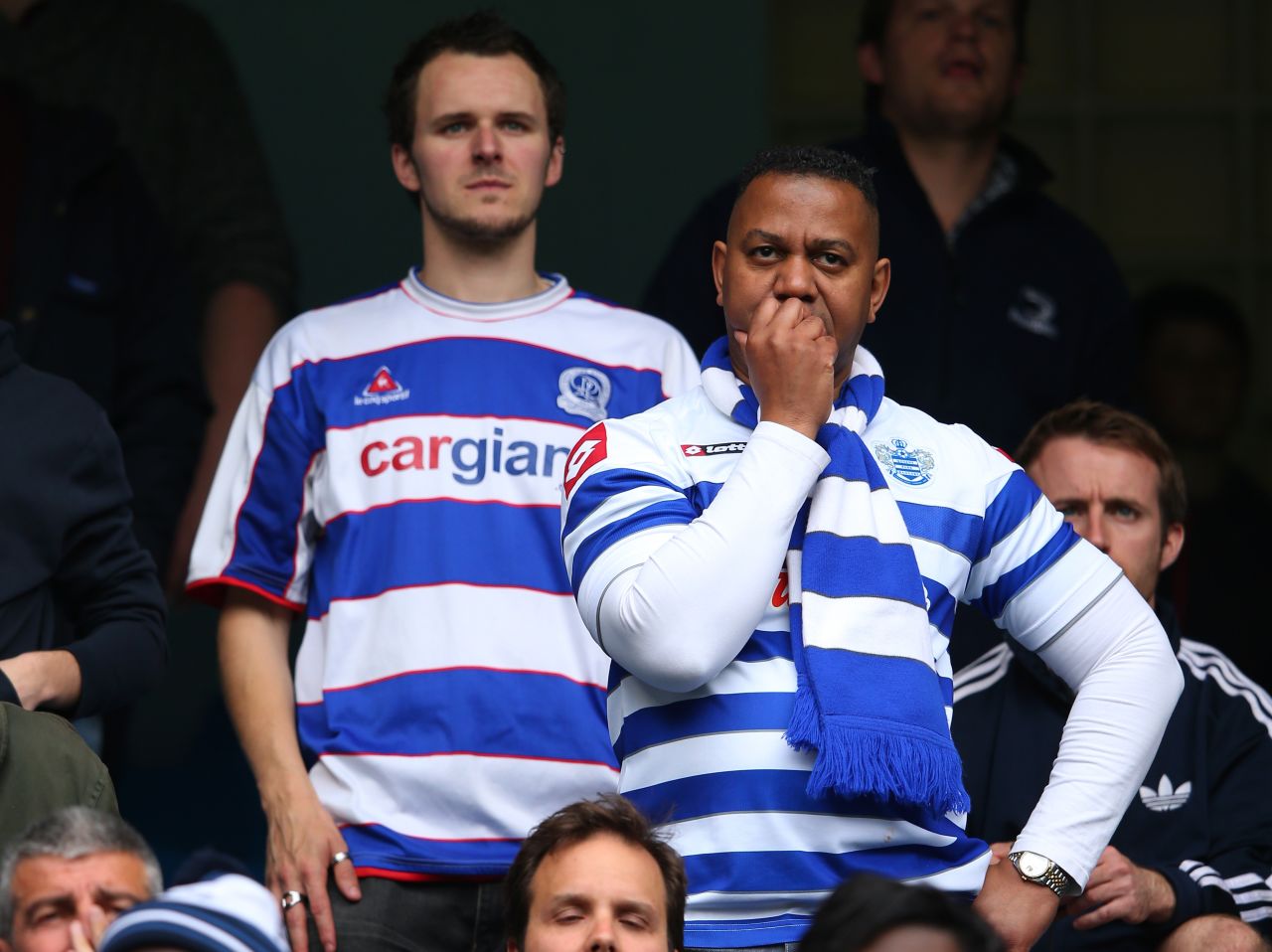 QPR fans look on as their relegation to the English Championship is confirmed.